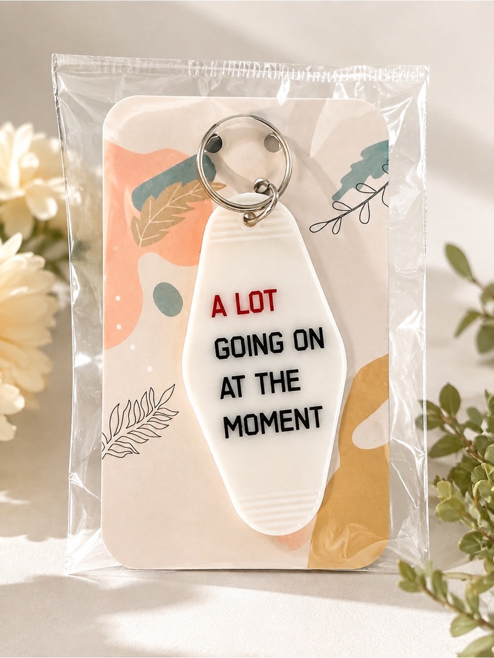 Taylor Swift Motel White Key Tag with Red and Black Lettering